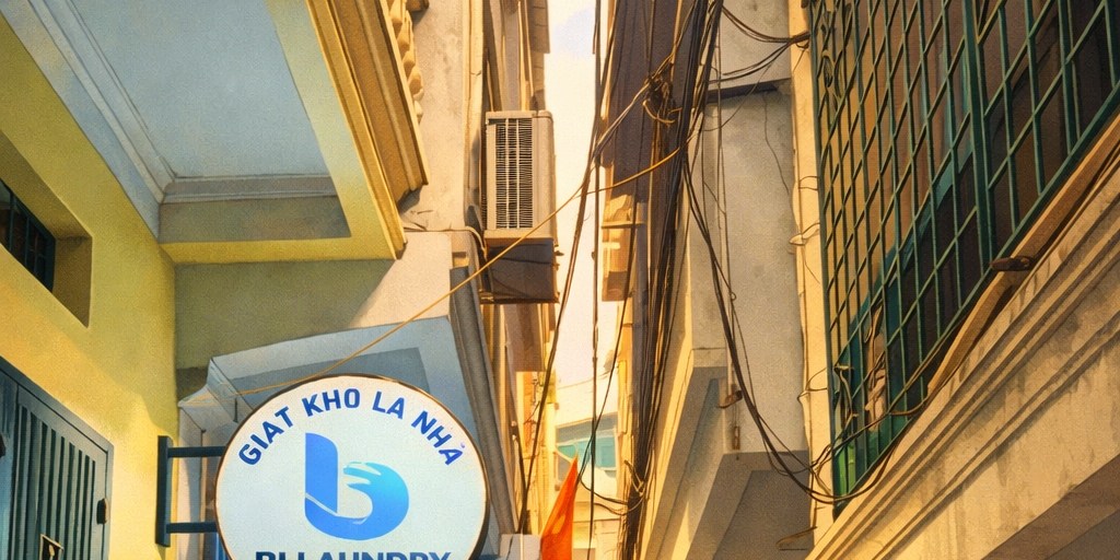 Mr.Bi Laundry shop sign in Hanoi